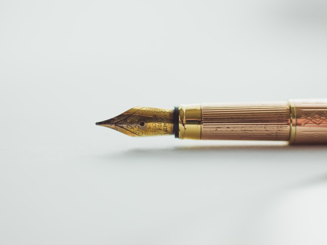 Fountain pen resting on a formal will document